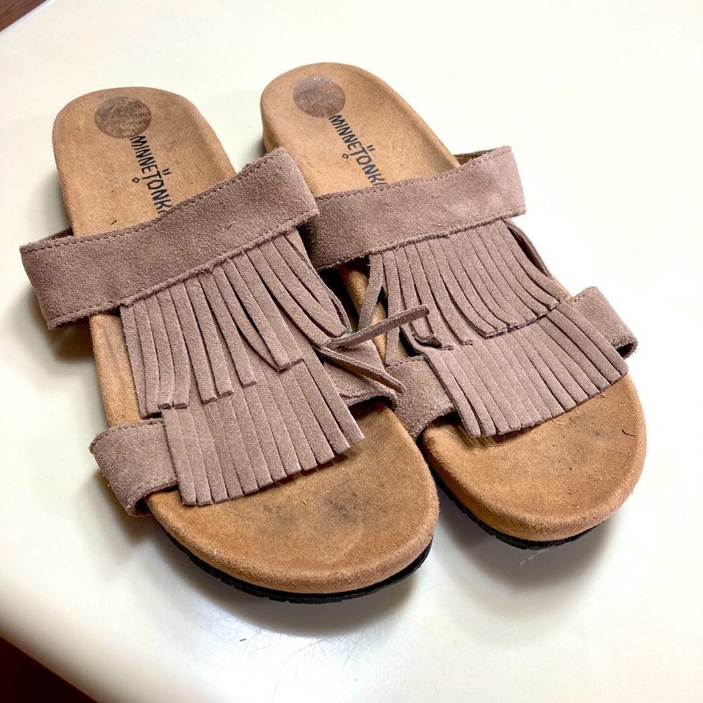 MinneTonka moccasin type sandals. They are used but I good shape. Size 7.5